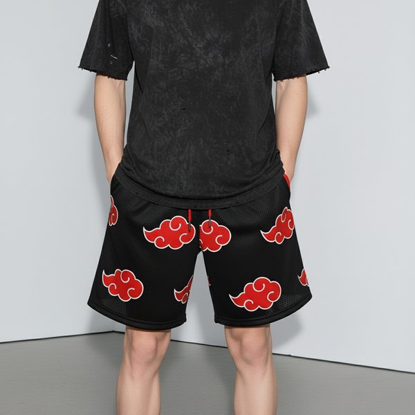 Black shorts with a repeated pattern of the Akatsuki cloud symbol from the anime series Naruto.