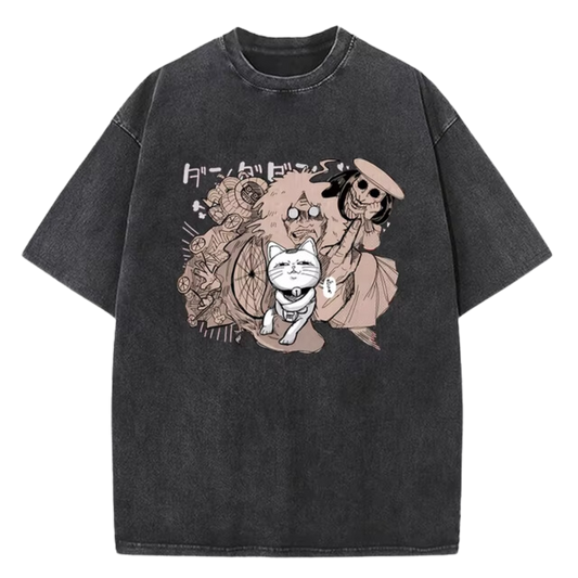 A black t-shirt with a distressed print featuring characters from the manga series "Dandadan." The image showcases Okarun, Momo Ayase, Ken Takakura, and Ayaka Saijo in a chaotic and humorous scene. The Japanese text on the shirt likely references characters or plot points from the series.