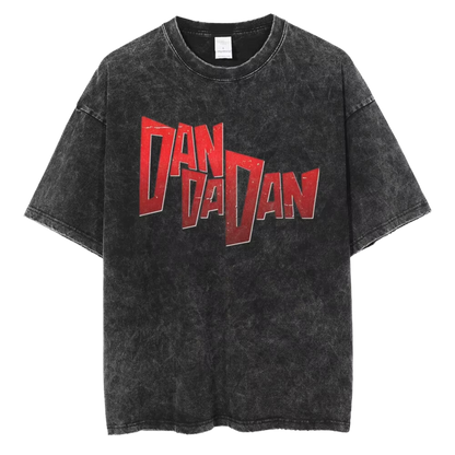 A black t-shirt with a distressed red print of the word "DANDAN" in a bold, stylized font.