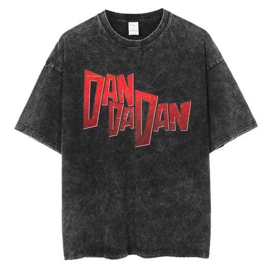 A black t-shirt with a distressed red print of the word "DANDAN" in a bold, stylized font.