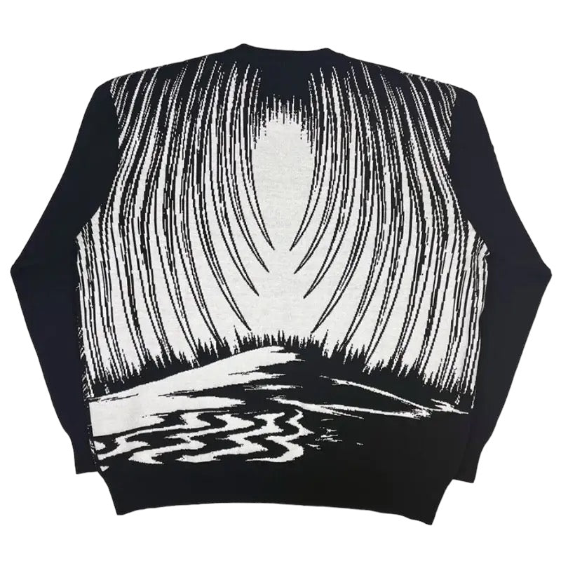 Le pull tricoté The Rumbling