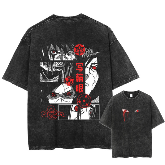 A black t-shirt with a distressed print featuring Madara and Sasuke Uchiha from Naruto, showcasing their Sharingan eyes and the Nine-Tails. The front of the shirt has a small print of the Sharingan eyes.