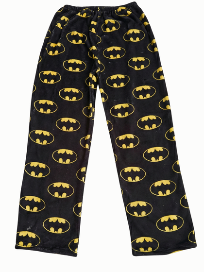 Black pajama pants with yellow Batman logos on a white background