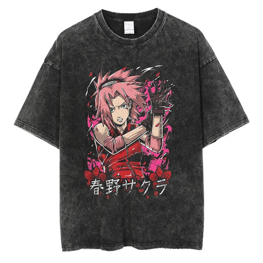 A black t-shirt with a distressed print of Sakura Haruno from Naruto. She is depicted in a fighting pose, with the Japanese text "Haruno Sakura" written below