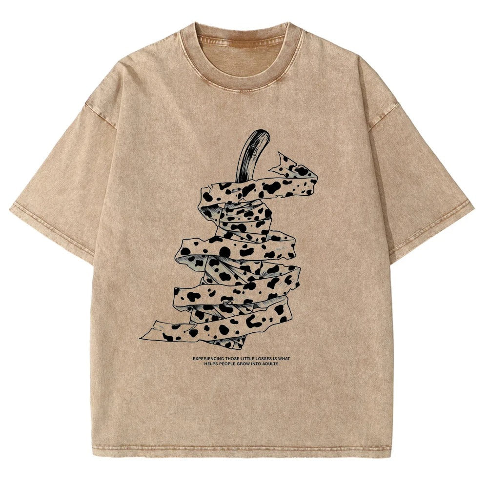 Front view of oversized 240 GSM vintage sand streetwear tee featuring a detailed graphic of Kento Nanami's wrapped blunt sword and his iconic quote from Jujutsu Kaisen.