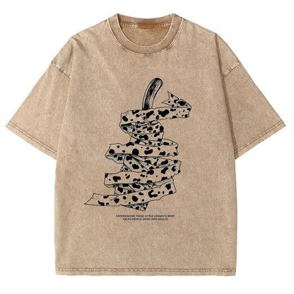 Front view of oversized 240 GSM vintage sand streetwear tee featuring a detailed graphic of Kento Nanami's wrapped blunt sword and his iconic quote from Jujutsu Kaisen.