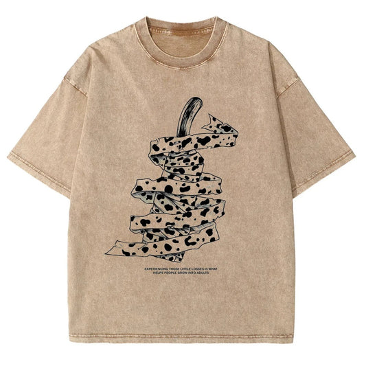 Front view of oversized 240 GSM vintage sand streetwear tee featuring a detailed graphic of Kento Nanami's wrapped blunt sword and his iconic quote from Jujutsu Kaisen.