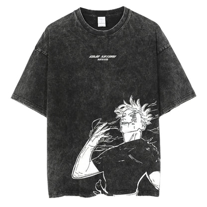 Front view of oversized 240 GSM vintage black acid wash streetwear tee. Features clean centered Jujutsu Kaisen typography and a large asymmetrical lower-torso graphic of an awakened Satoru Gojo.