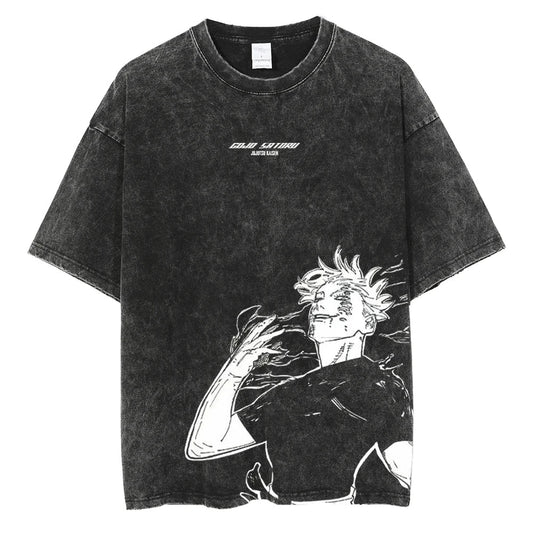 Front view of oversized 240 GSM vintage black acid wash streetwear tee. Features clean centered Jujutsu Kaisen typography and a large asymmetrical lower-torso graphic of an awakened Satoru Gojo.