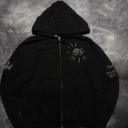 Black heavyweight cotton zip-up hoodie featuring high-density evil eye chest embroidery by SkaiiyPrints.