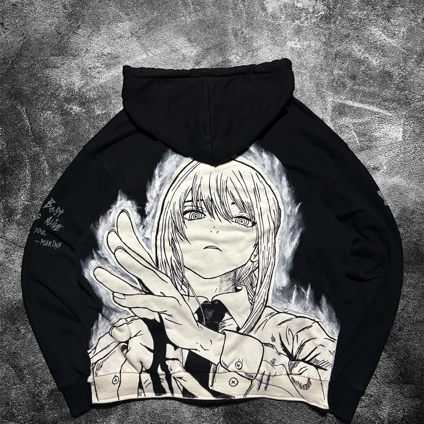 Back view of the SkaiiyPrints heavyweight zip-up hoodie featuring a large Makima manga panel graphic.
