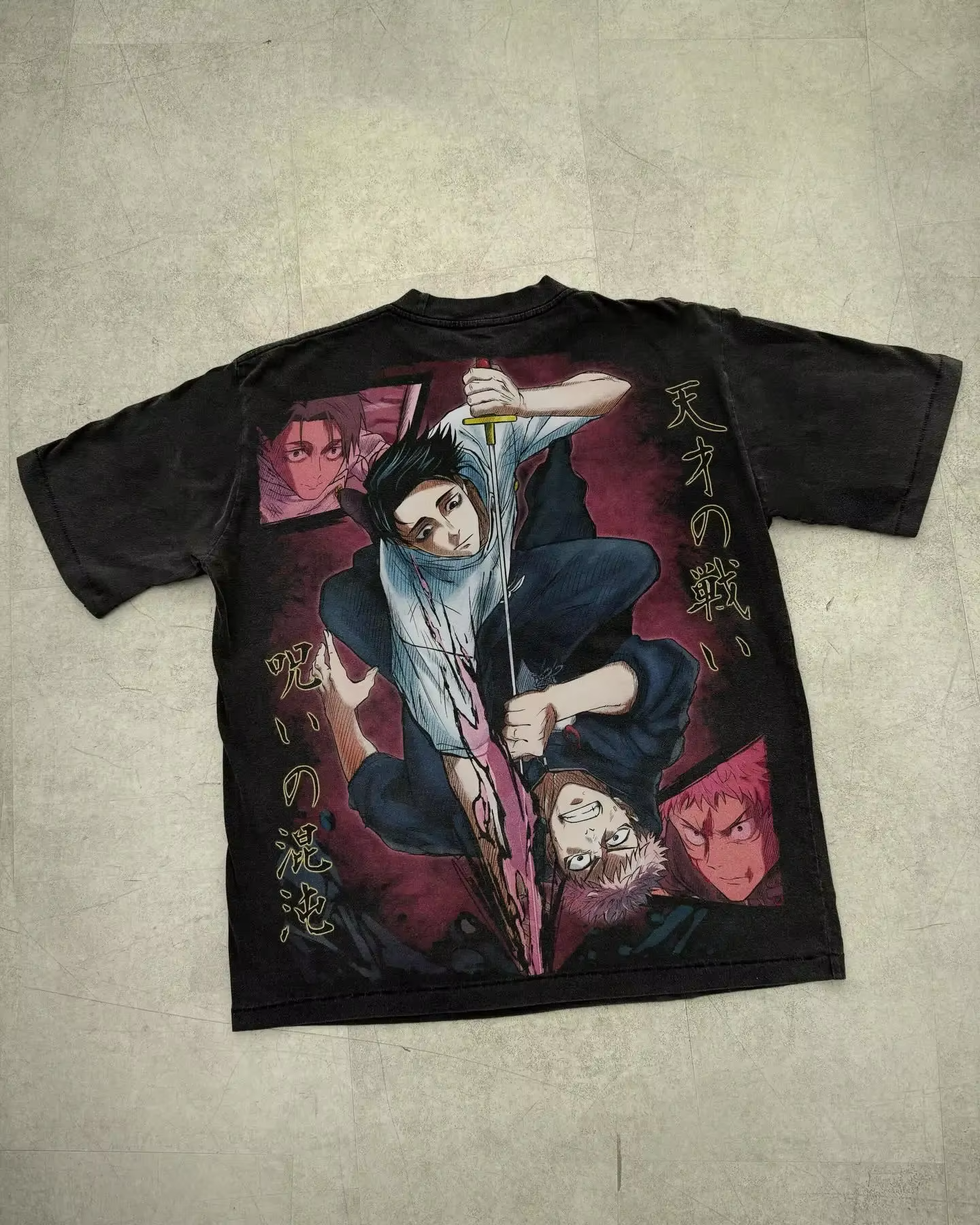 Flat lay of the vintage black Yuta Okkotsu heavyweight graphic t-shirt showing the edge-to-edge back manga panel.